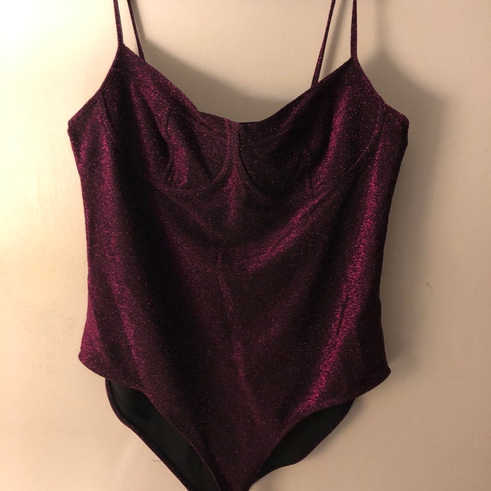 Pink sparkly body suit